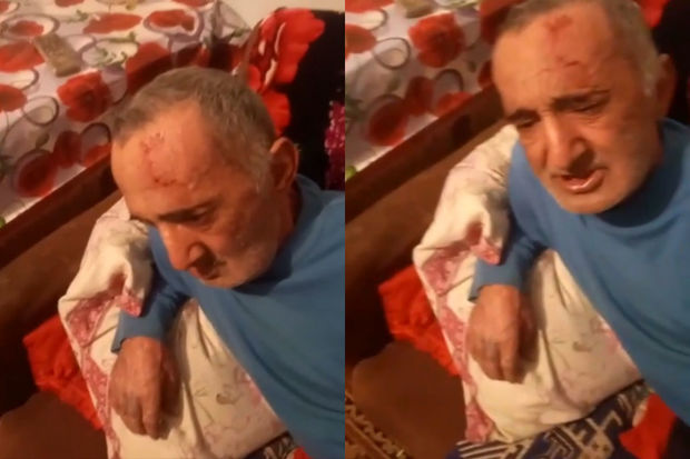 Bakıda oğul atasını döydü, qardaşı isə lentə aldı - Video